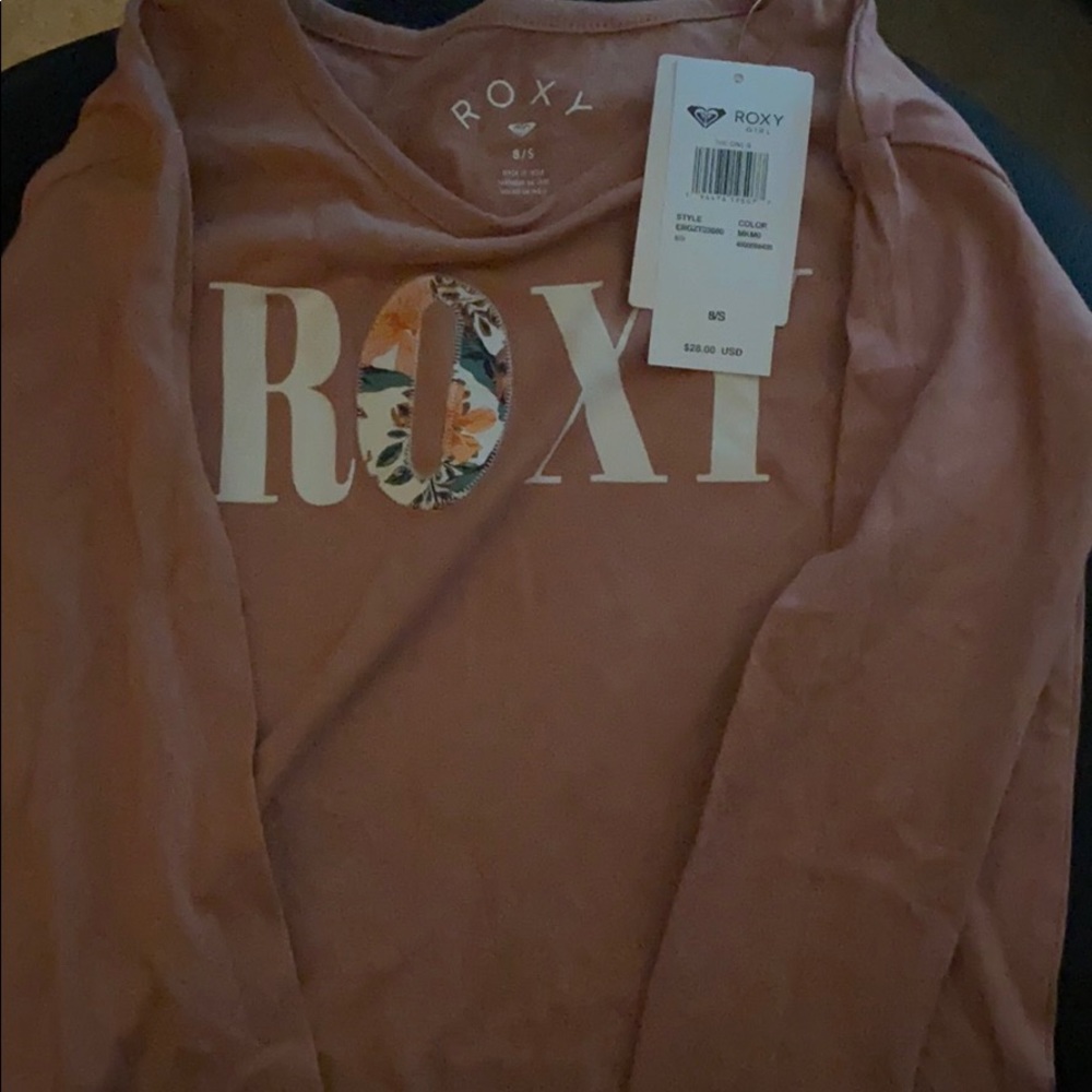 A girls kid Roxy long sleeve shirt